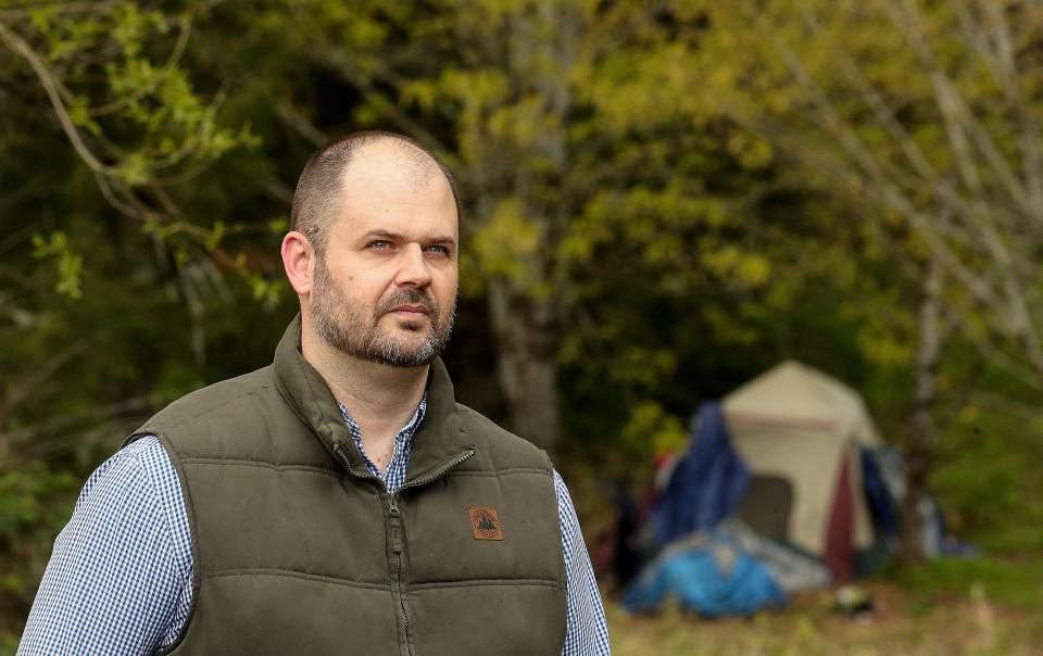 Founding Kitsap County HEART Coordinator Jarrod Moran during a clean-up at Veterans Memorial Park in Port Orchard on April 22, 2022. Moran left the role in April and the county is currently seeking a new director to lead the team focused on making connections in homeless encampments.