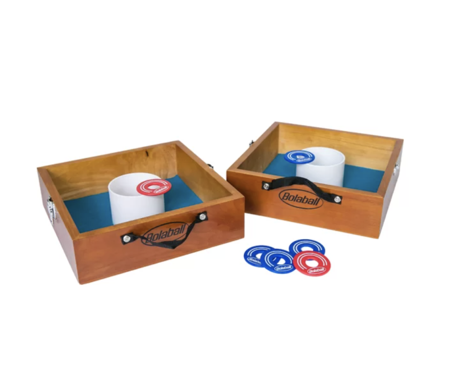 10 Piece Washer Toss Set in two wooden boxes with white cups, red and blue pieces (Photo via Wayfair)