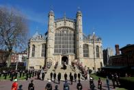 <p>The coffin is carried up the steps of the chapel. </p>