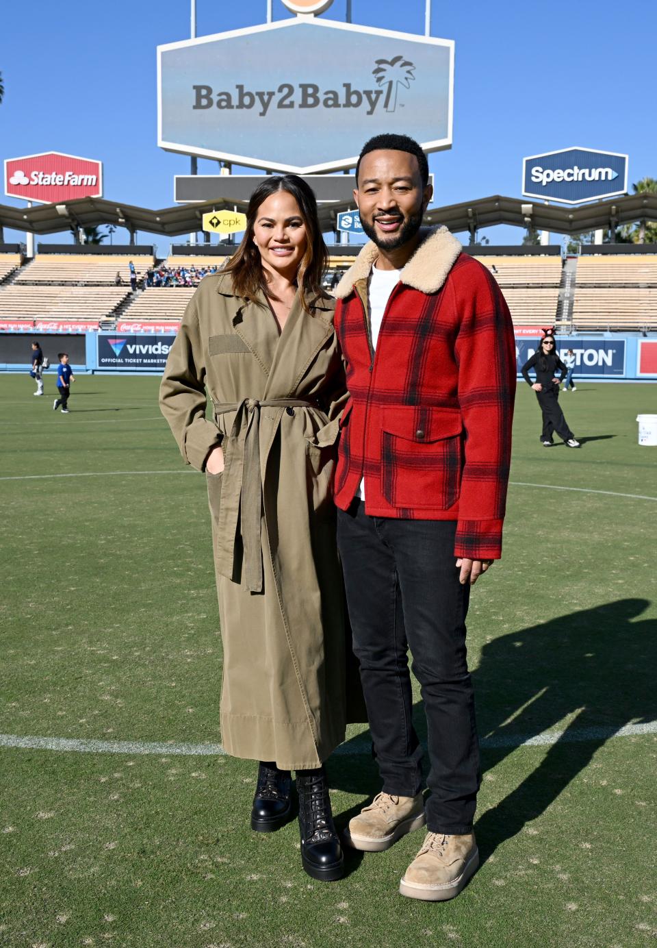 LOS ANGELES, CALIFORNIA - DECEMBER 13: Chrissy Teigen and John Legend attend the 2023 Baby2Baby Holiday Distribution presented by FRAME & Nordstrom at Dodger Stadium on December 13, 2023 in Los Angeles, California. (Photo by Michael Kovac/Getty Images for Baby2Baby)