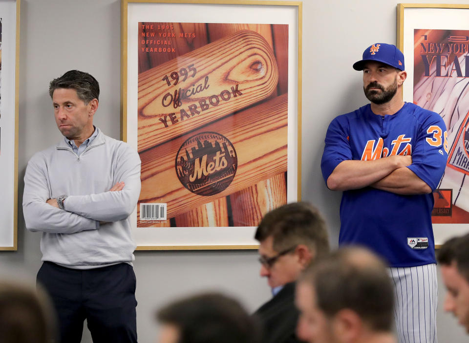 NEW YORK, NEW YORK - MAY 20:  New York Mets chief operating officer Jeff Wilpon and manager Mickey Callaway #36 of the New York Mets listen to Mets general manager Brodie Van Wagenen speak during a press conference at Citi Field on May 20, 2019 in the Flushing neighborhood of the Queens borough of New York City. (Photo by Elsa/Getty Images)