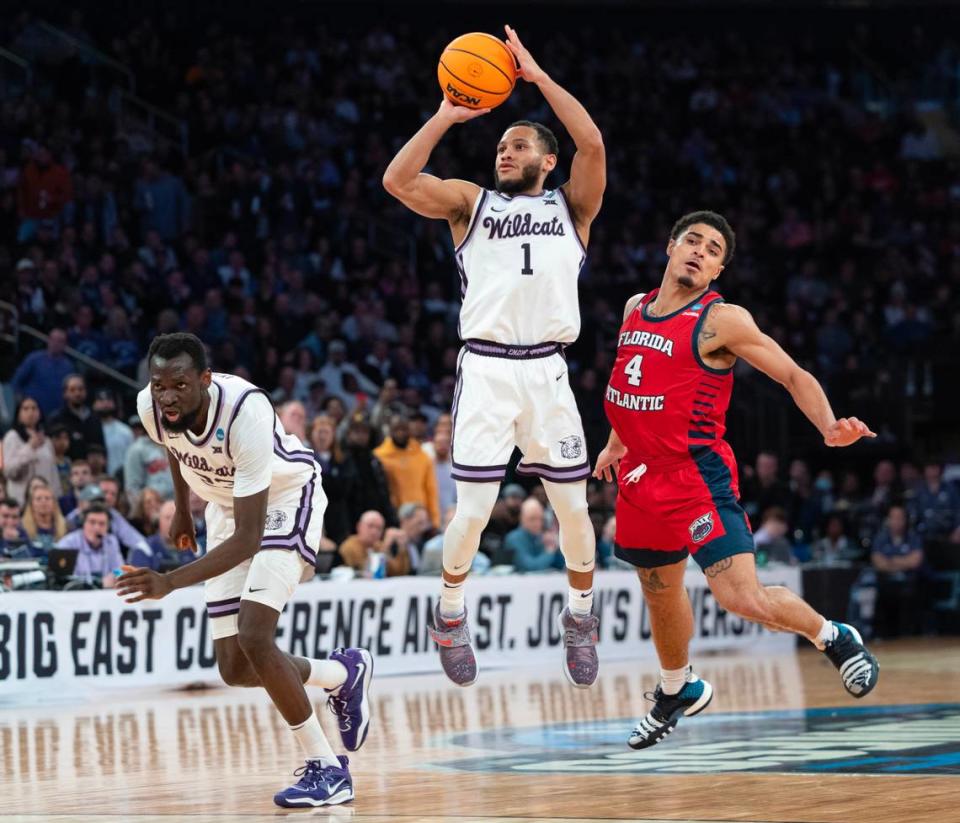 Kansas State’s Markquis Nowell shoots the ball over Florida Atlantic’s Bryan Greenlee during the first half of their east region final game at Madison Square Garden on Saturday night.