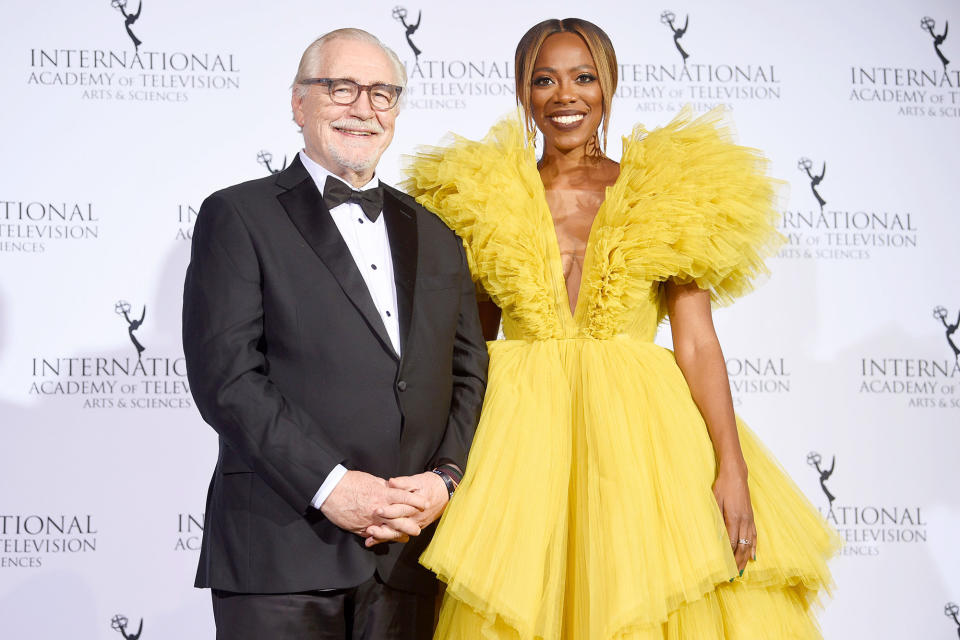 <p>Brian Cox and Yvonne Orji smile for the cameras inside the press room at the 49th International Emmy Awards at Casa Cipriani in N.Y.C. on Nov. 22.</p>