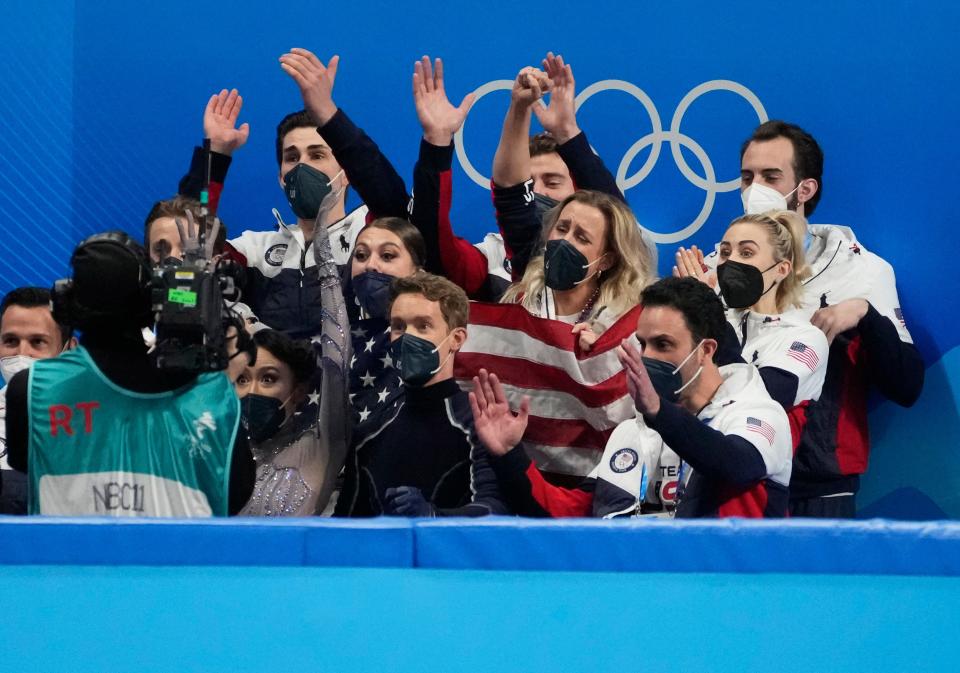 U.S. figure skaters react in the kiss-and-cry area during the 2022 Beijing Olympics.