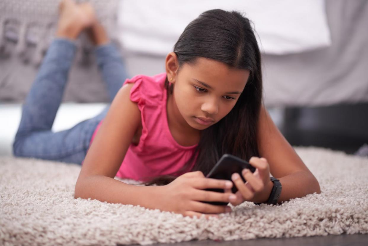 For younger children in particular, checking in on what they're seeing on social media is critical. <a href="https://www.gettyimages.com/detail/photo/looking-for-some-entertainment-online-royalty-free-image/1049816596?phrase=kids+watching+violent+images+on+social+media&searchscope=image%2Cfilm&adppopup=true" rel="nofollow noopener" target="_blank" data-ylk="slk:Tassii/E+ via Getty Images;elm:context_link;itc:0;sec:content-canvas" class="link ">Tassii/E+ via Getty Images</a>