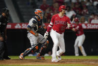 Los Angeles Angels' Shohei Ohtani (17) strikes out during the sixth inning of a baseball game against the Houston Astros, Monday, Sept. 20, 2021, in Anaheim, Calif. (AP Photo/Marcio Jose Sanchez)