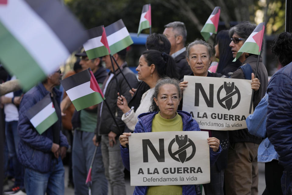 FILE - Members of social groups and political organizations march during a day of solidarity with the Palestinian people and against the Israel-Hamas war, in Bogota, Colombia, Nov. 29, 2023. Colombia has become the latest Latin American country to announce it will break diplomatic relations with Israel over its military campaign in Gaza. (AP Photo/Fernando Vergara, File)