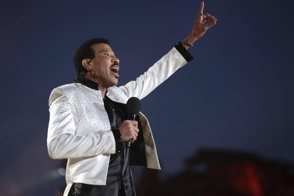 US singer Lionel Richie performs during a concert at Windsor Castle in Windsor, England, Sunday, May 7, 2023, celebrating the coronation of King Charles III. It’s one of several events over a three-day weekend of celebrations. (Chris Jackson/Pool Photo via AP)