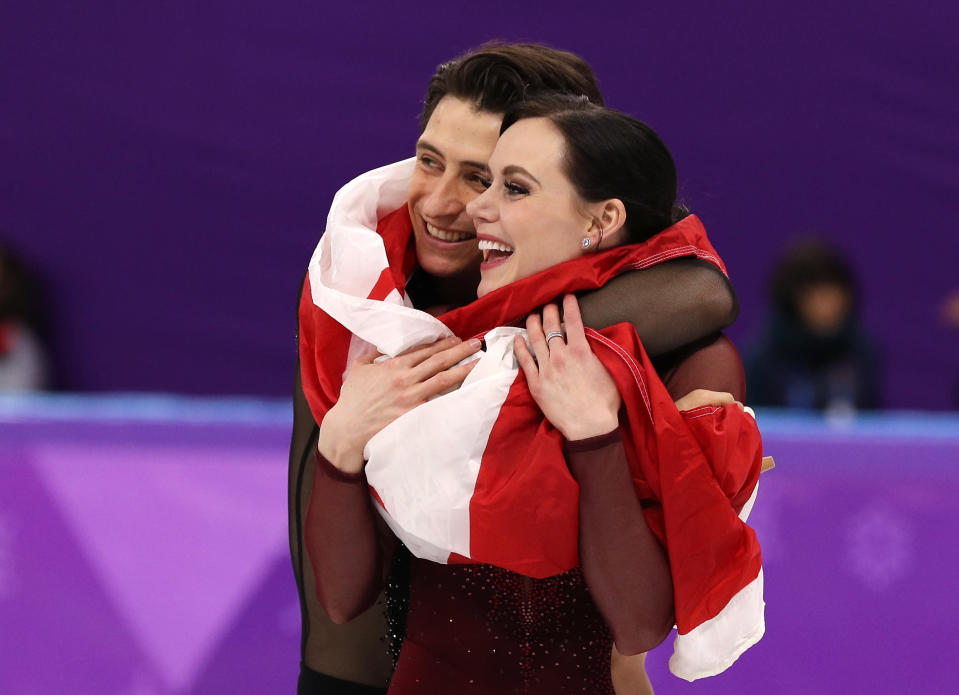 <p>Gold medal winners Tessa Virtue and Scott Moir of Canada celebrate during the victory ceremony for the Figure Skating Ice Dance Free Dance at the PyeongChang 2018 Winter Olympic Games on February 20, 2018.<br>(Photo by Maddie Meyer/Getty Images) </p>