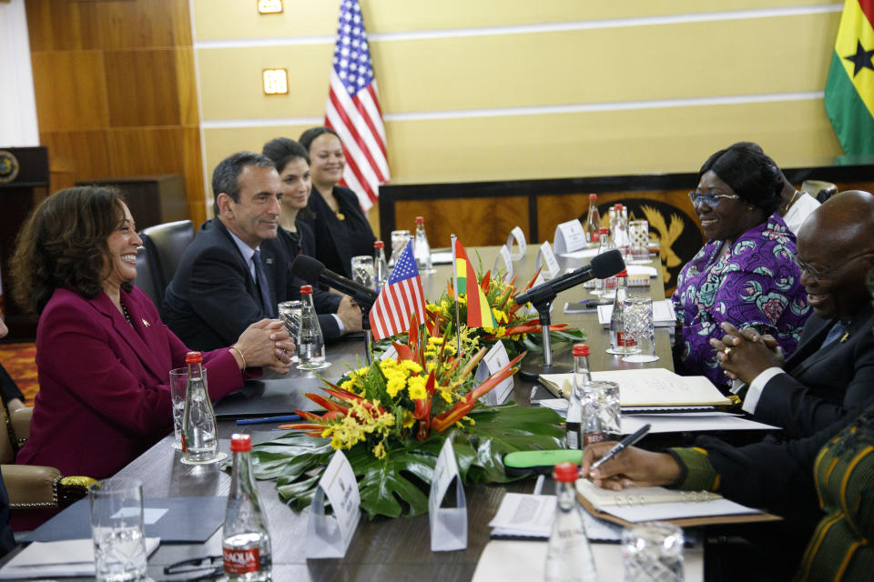 U.S. Vice President Kamala Harris, left, takes part in a meeting with Ghana President Nana Akufo-Addo, opposite, in Accra, Ghana, Monday March 27, 2023. Harris is on a seven-day African visit that will also take her to Tanzania and Zambia. (AP Photo/Misper Apawu, Pool)