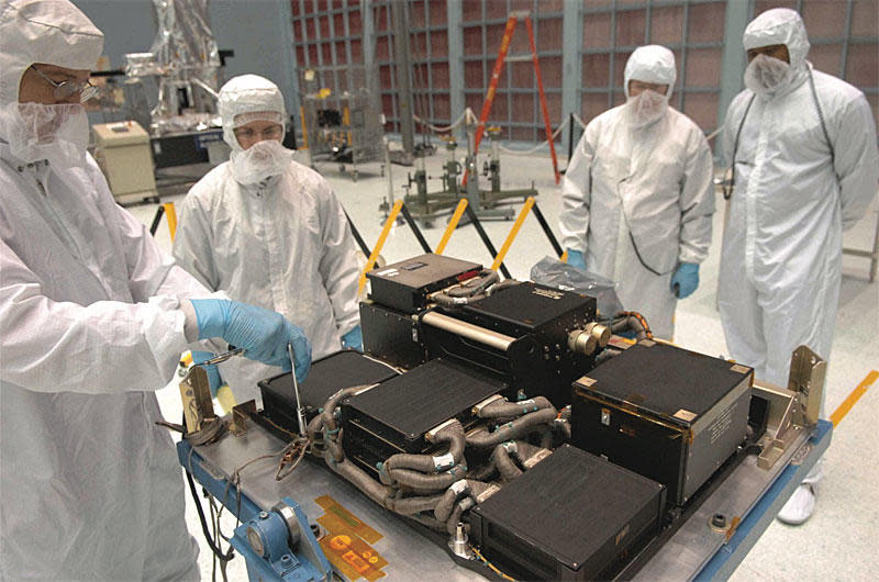 A replacement Science Instrument Command and Data Handling system is inspected prior to launch and installation in the Hubble Space Telescope during the 2009 shuttle servicing mission. A component in the SI C&DH apparently malfunctioned June 13, interrupting science observations.  / Credit: NASA