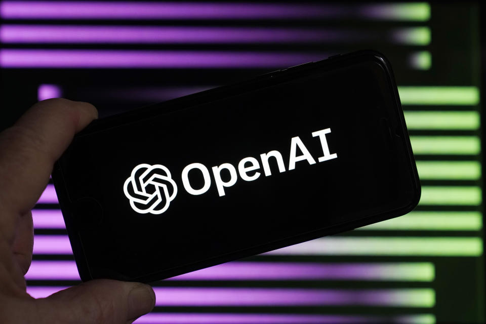 FILE - The logo for OpenAI, the maker of ChatGPT, appears on a mobile phone, in New York, Tuesday, Jan. 31, 2023. (AP Photo/Richard Drew, File)