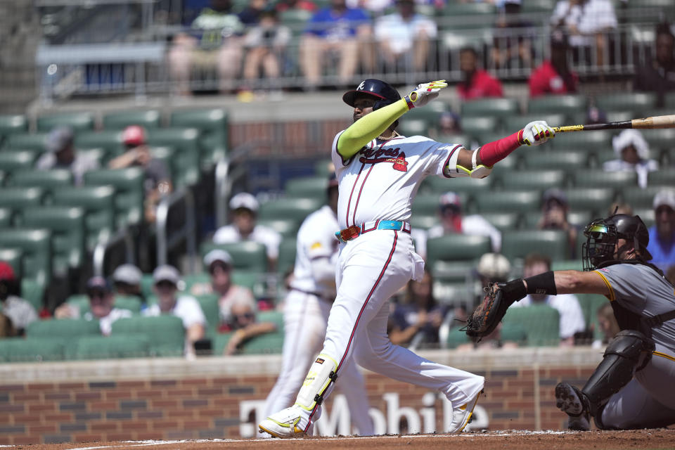 Atlanta Braves' Marcell Ozuna (20) hits a double in the first inning of a baseball game against the Pittsburgh Pirates, Sunday, June 30, 2024, in Atlanta. (AP Photo/Brynn Anderson)