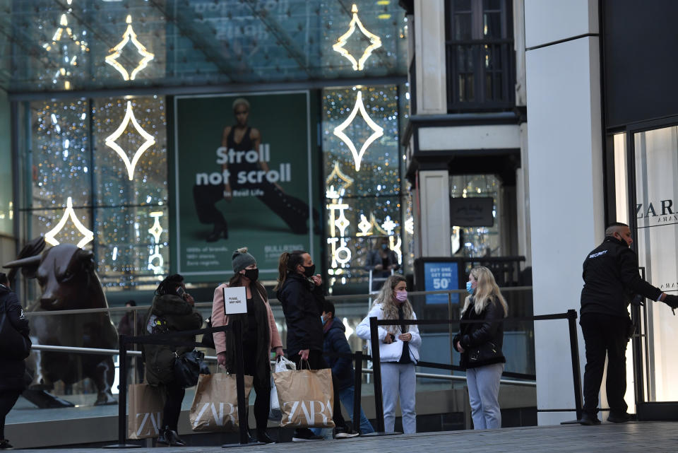 People queueing outside Zara in Birmingham as non-essential shops in England open their doors to customers for the first time after the second national lockdown ends and England has a strengthened tiered system of regional coronavirus restrictions.