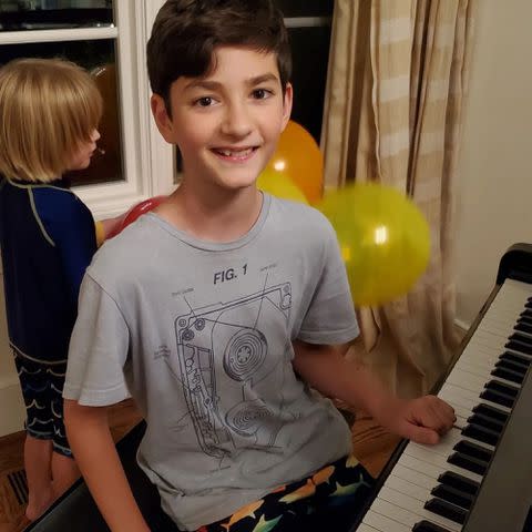 <p>Danica McKellar Instagram</p> Danica McKellar's son Draco Verta playing the piano.
