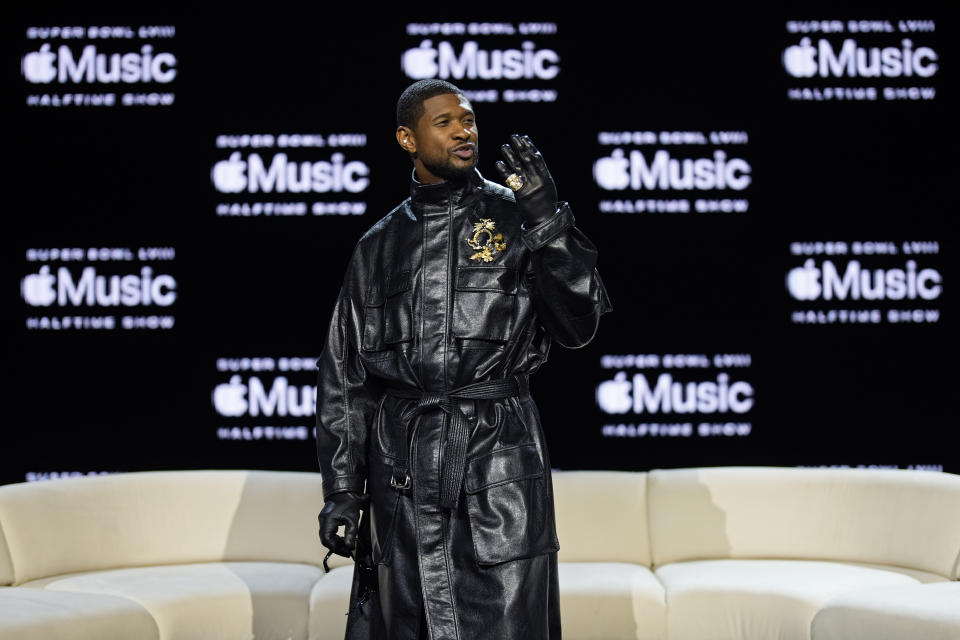 Usher poses for photographers during a news conference ahead of the Super Bowl 58 NFL football game Thursday, Feb. 8, 2024, in Las Vegas. Usher will perform during the Super Bowl halftime show. (AP Photo/John Locher)