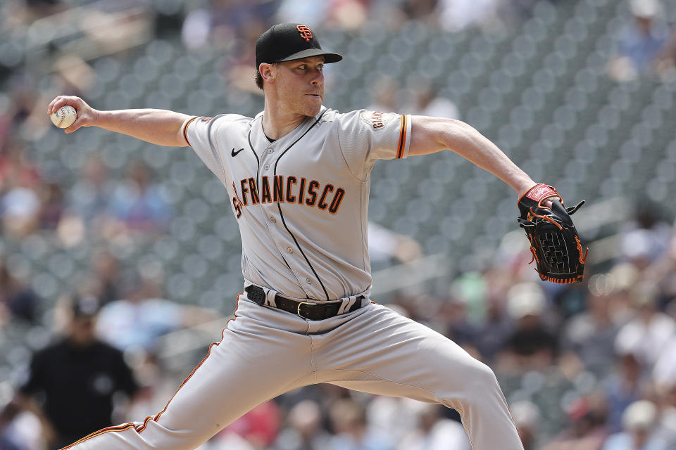 San Francisco Giants starting pitcher Anthony DeSclafani (26) throws during the first inning of a baseball game against the Minnesota Twins, Wednesday, May 24, 2023, in Minneapolis. (AP Photo/Stacy Bengs)