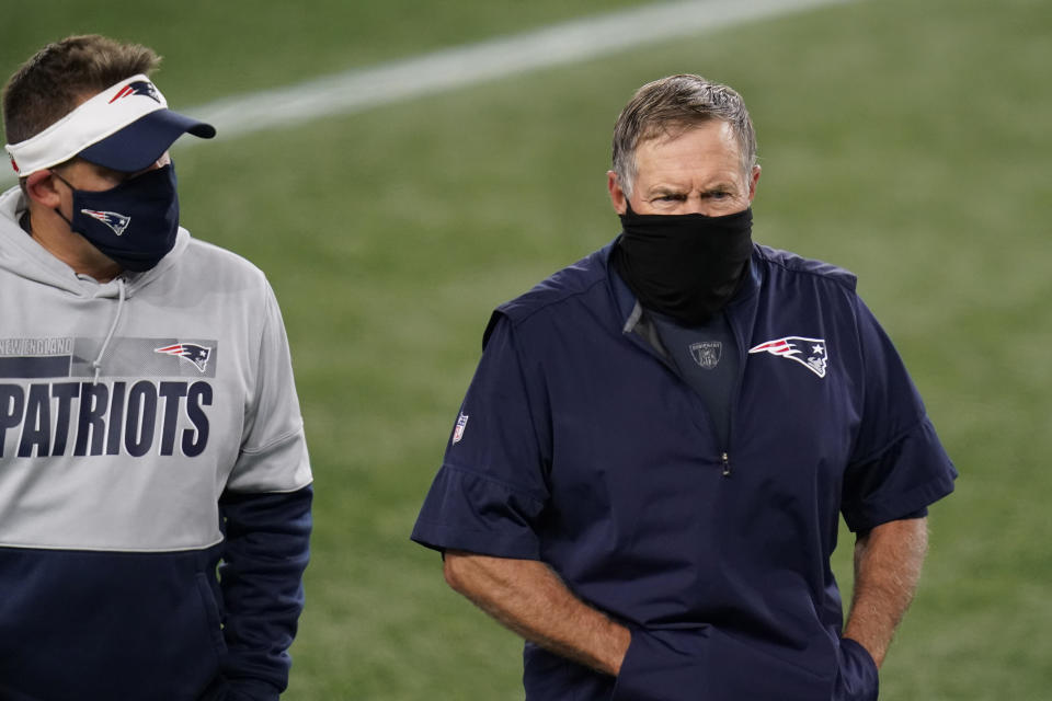 New England Patriots offensive coordinator Josh McDaniels and head coach Bill Belichick leave the field after an NFL football game against the San Francisco 49ers, Sunday, Oct. 25, 2020, in Foxborough, Mass. (AP Photo/Charles Krupa)