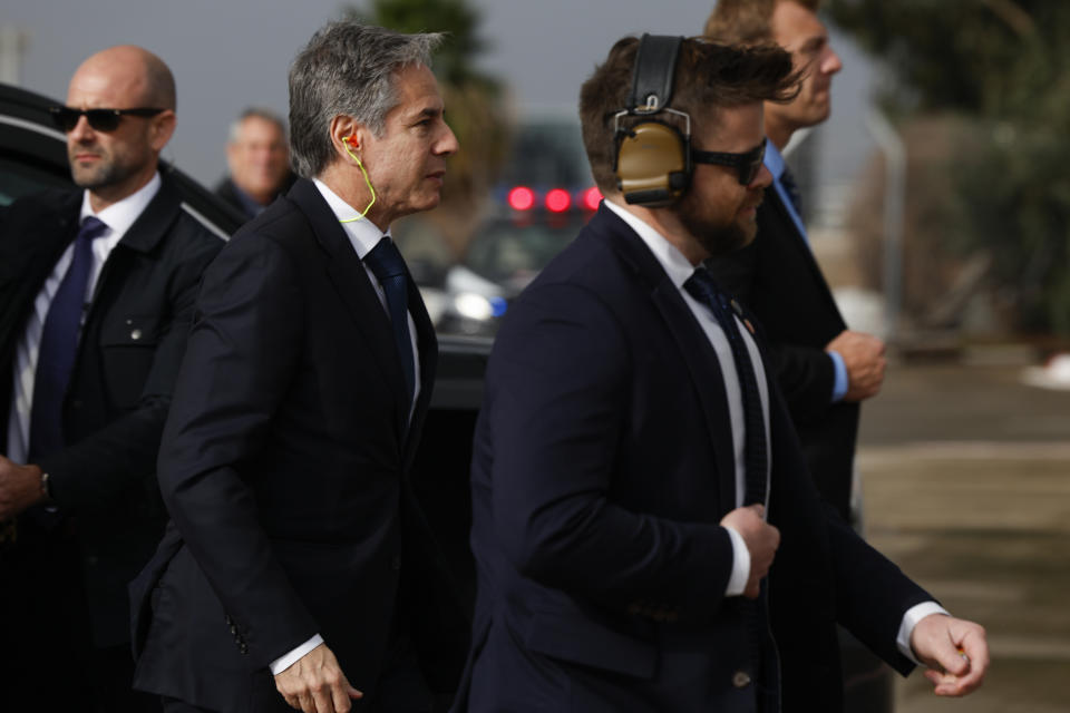 U.S. Secretary of State Antony Blinken, center left, prepares to board a C-17 aircraft to leave for Cairo, during his week-long trip aimed at calming tensions across the Middle East, in Tel Aviv, Israel Thursday, Jan. 11, 2024. (Evelyn Hockstein/Pool Photo via AP)