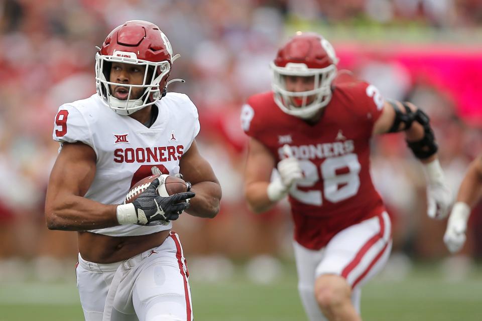 Brayden Willis (9) runs after a reception during the Sooners' spring game on April 23 at Gaylord Family-Oklahoma Memorial Stadium in Norman.