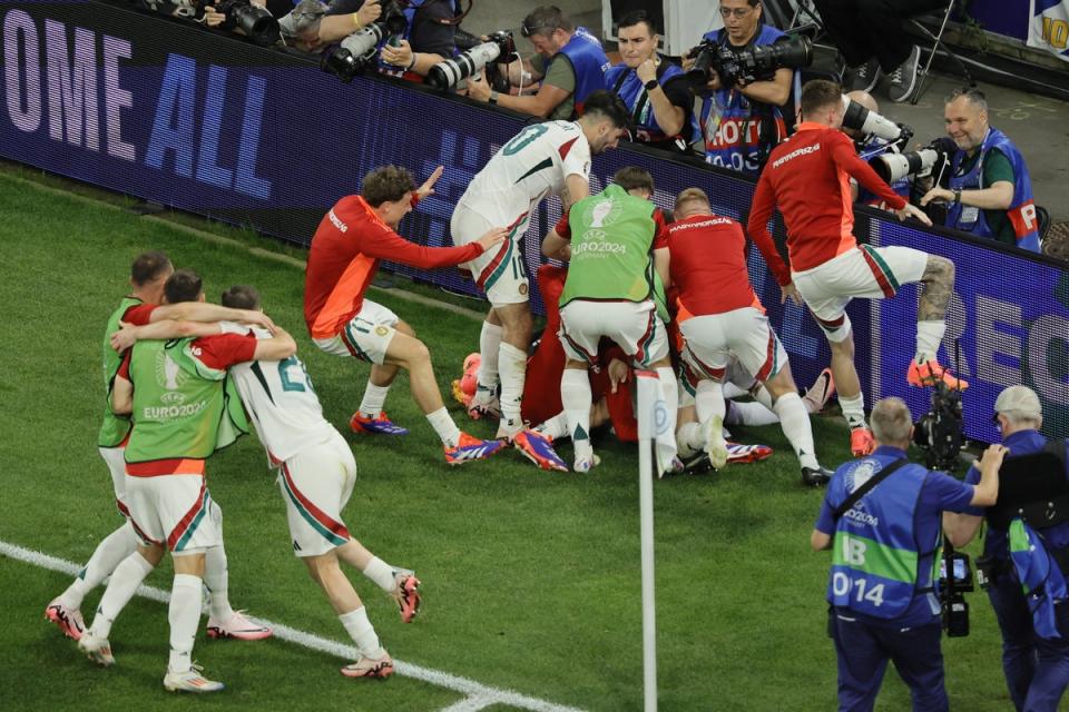 Hungary celebrated a dramatic late win (EPA)