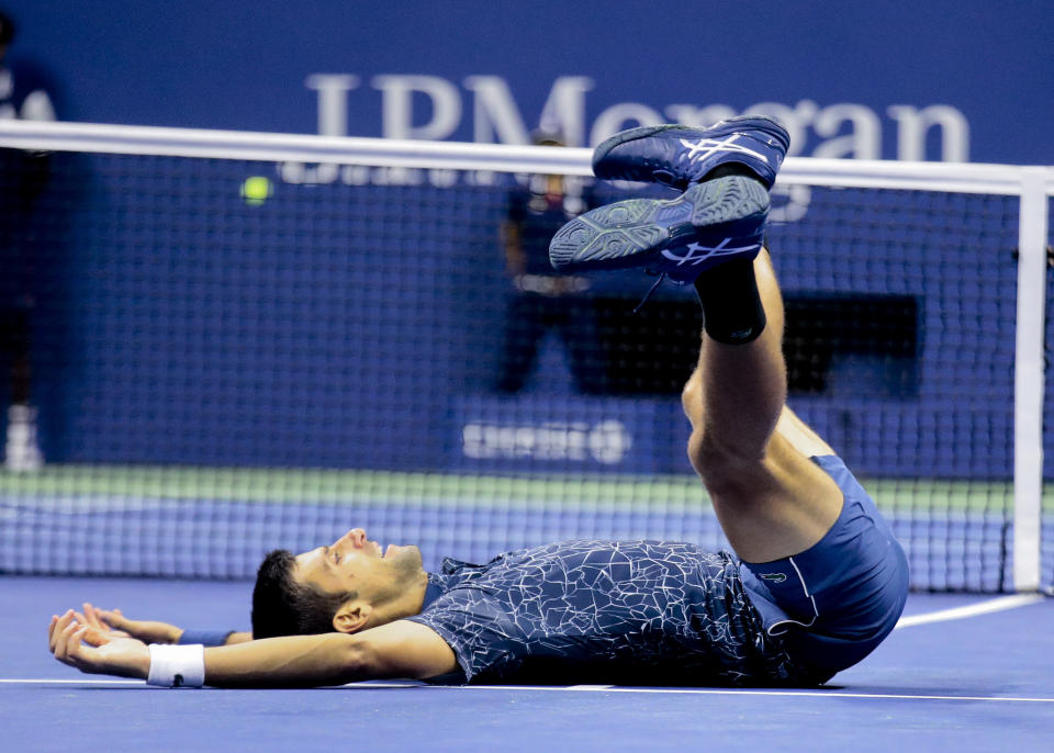 Novak Djokovic, of Serbia, celebrates after defeating Juan Martin del Potro, of Argentina, in the men's final of the U.S. Open tennis tournament, Sunday, Sept. 9, 2018, in New York. (AP Photo/Andres Kudacki)