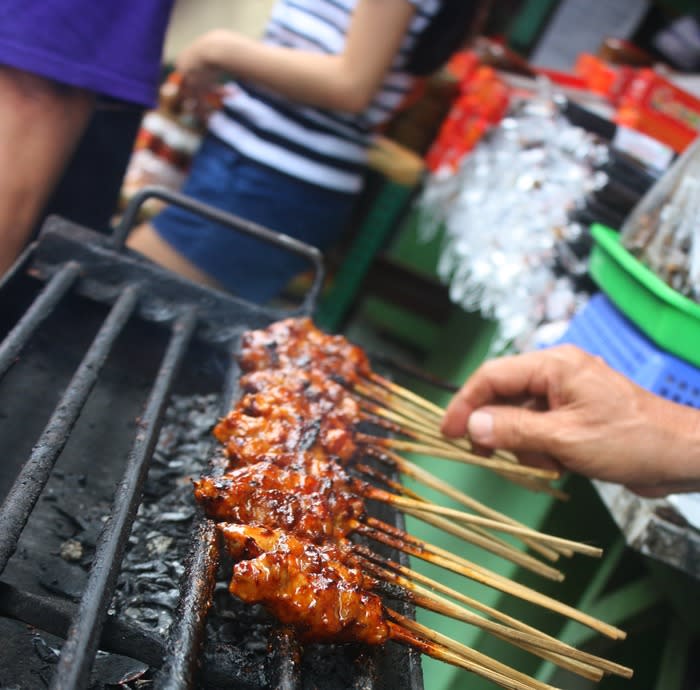 Pork satay: There are a number of vendors at the market who sell grilled pork satay marinated in sweet soy sauce.