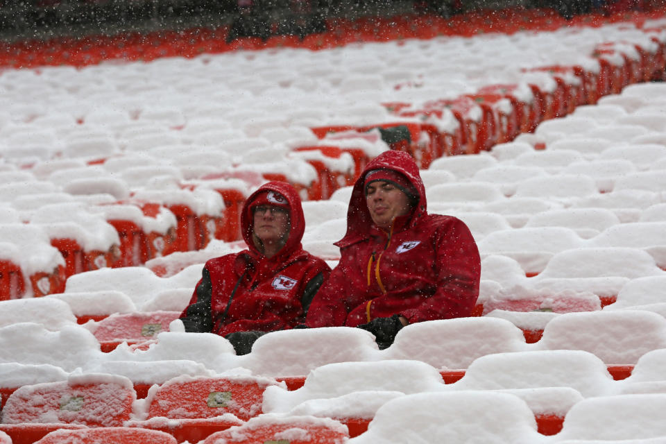 Fans sit in the cold and snow before an AFC divisional playoff game game on Jan. 12, 2019, at Arrowhead Stadium. Saturday's game might be even colder. (Photo by Scott Winters/Icon Sportswire via Getty Images)