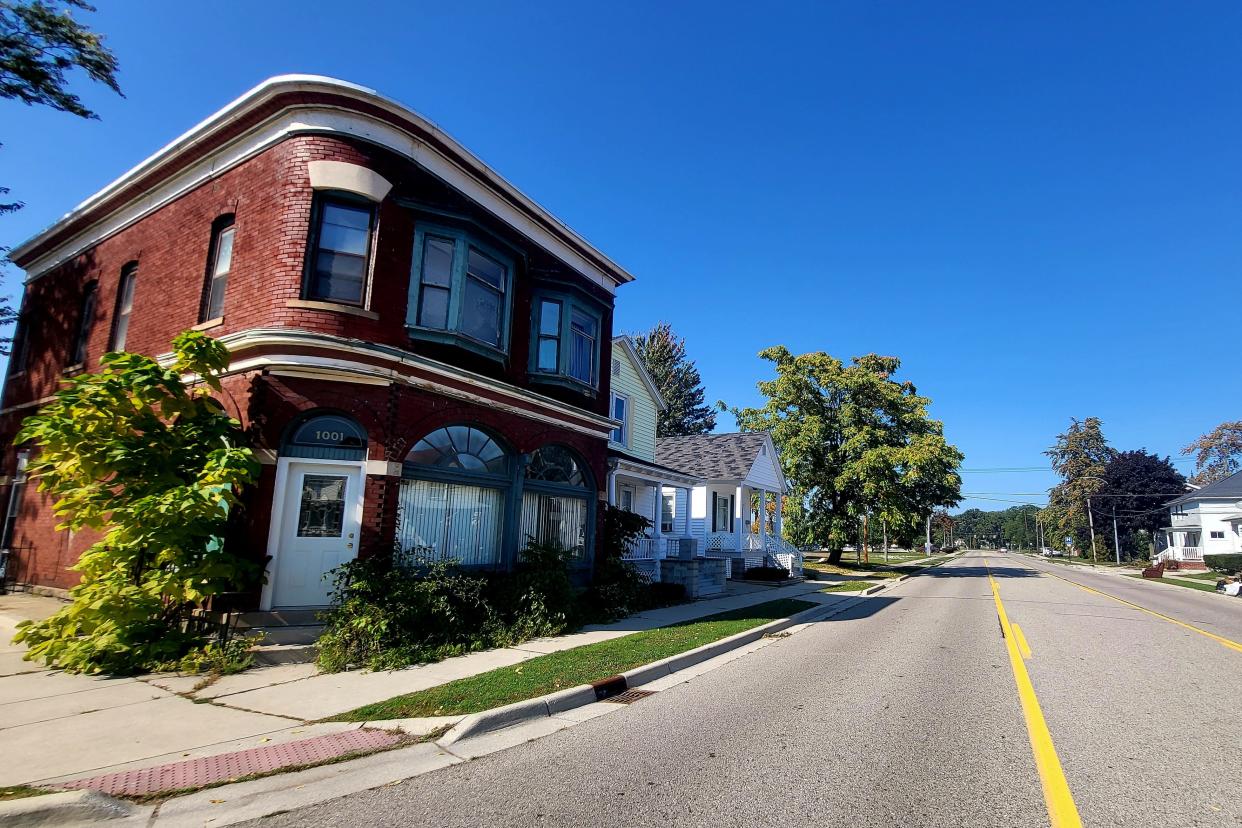 Property owned by McLaren Port Huron along Erie Street could be part of a "high-rise, multi-family" development with apartments under a rezoning request.. That includes the corner building, pictured on Monday, Oct. 2, 2023, at 805 Rawlins St.