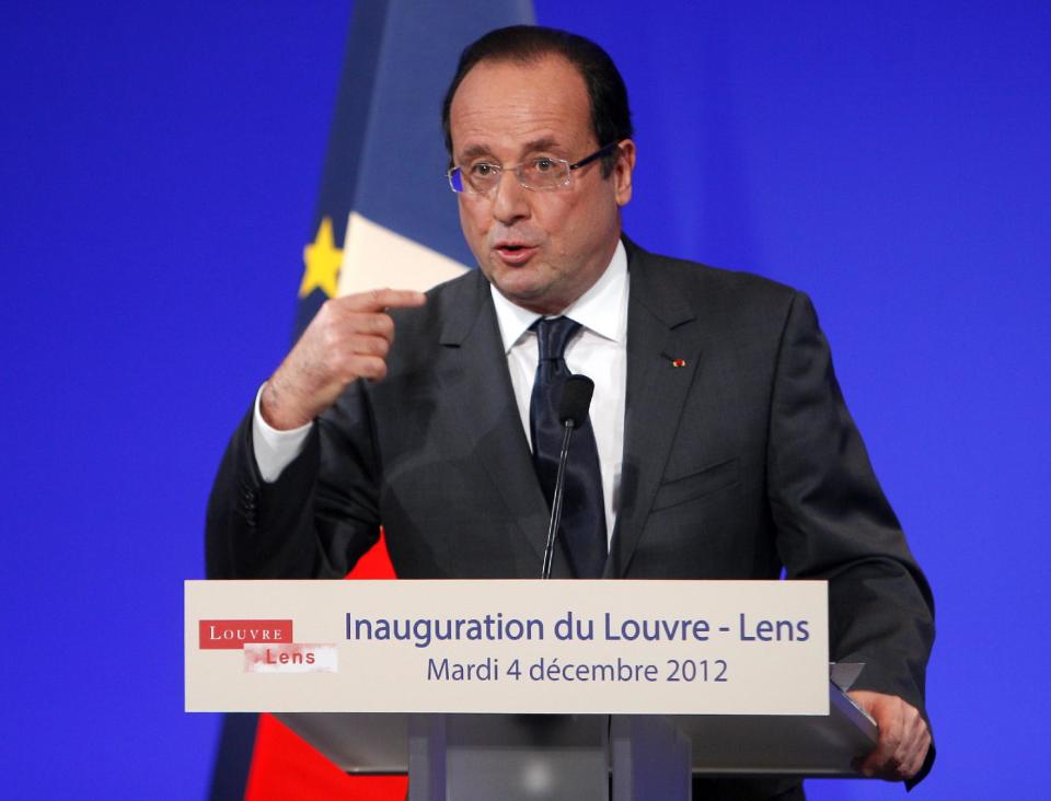 France's President Francois Hollande deliveers a speech during the inauguration of the Louvre Museum in Lens, northern France, Tuesday, Dec. 4, 2012. TThe museum in Lens is to open on Dec. 12, as part of a strategy to spread art beyond the traditional bastions of culture in Paris to new audiences in the provinces.(AP Photo/Michel Spingler, Pool)