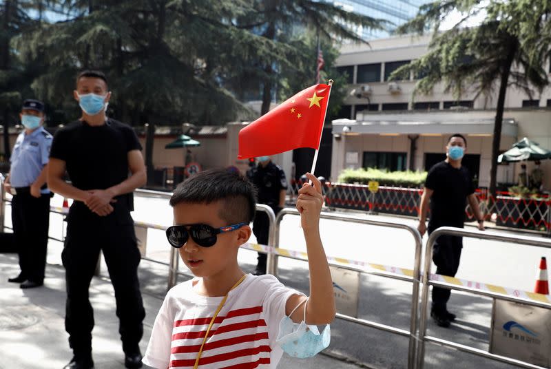 Tight security outside U.S. Chengdu consulate as staff inside prepare to leave, after China ordered its closure in response to U.S. order for China to shut its consulate in Houston