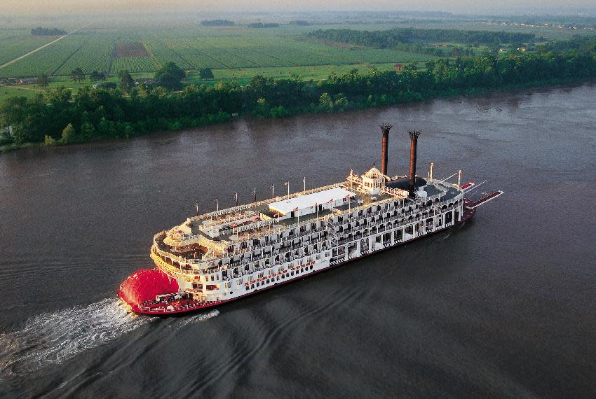 This image from the mid-1990s provided by the Great American Steamboat Company shows the American Queen riverboat on the Mississippi River outside New Orleans. The ship last sailed the Mississippi and Ohio rivers in 2008 but resumes riverboat cruising in late April following a multi-million dollar refurbishment. (AP Photos/Great American Steamboat Company)