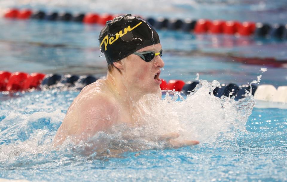 Collin Fleming of Penn competes in the 100 Yard Breaststroke during the NIC Boys Swimming Finals Saturday, Jan. 28, 2023 at the Elkhart Aquatics Center.