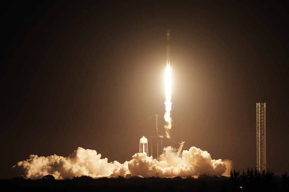 A SpaceX Falcon 9 rocket lifts off from pad 39A at Kennedy Space Center in Cape Canaveral, Fla., early Thursday, Feb. 15, 2024. The rocket is carrying Intuitive Machines’ lunar lander on its way to the moon. If all goes well, a touchdown attempt would occur Feb. 22, after a day in lunar orbit.(AP Photo/John Raoux)