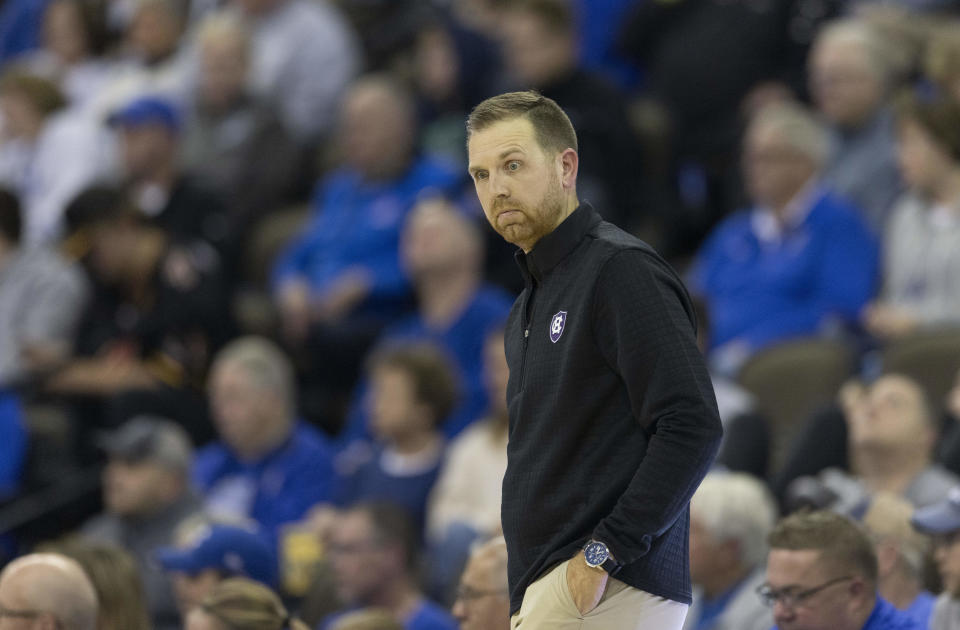 Holy Cross head coach Brett Nelson reacts after a play against Creighton during the first half of an NCAA college basketball game on Monday, Nov. 14, 2022, in Omaha, Neb. (AP Photo/Rebecca S. Gratz)