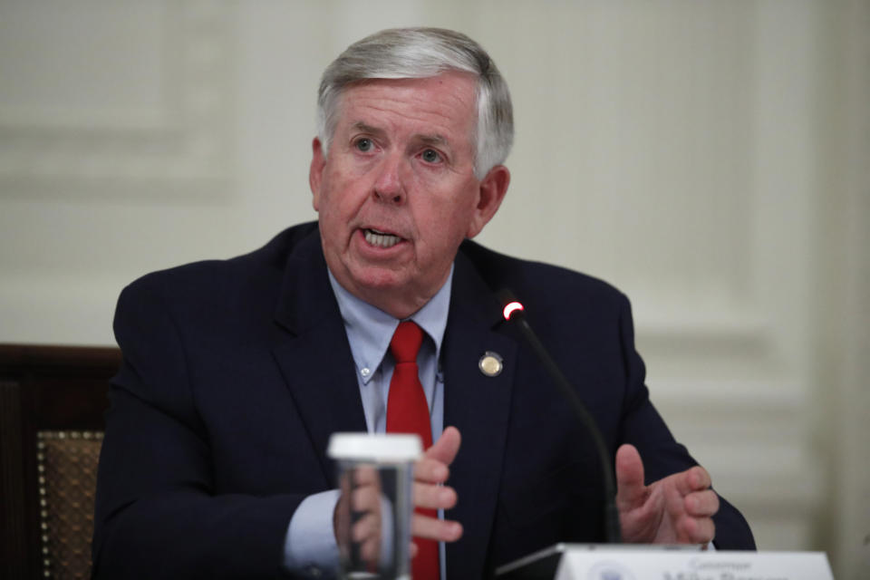 FILE - In this July 7, 2020, file photo, Missouri Gov. Mike Parson speaks during an event at the White House, in Washington. Missouri voters are set to decide whether to expand Medicaid health care coverage to thousands more low-income adults. A proposal to amend the state Constitution to expand eligibility for Medicaid is on Tuesday, Aug. 4, 2020s' ballot. Parson, who opposes Medicaid expansion and is up for election this year, in May moved the vote on the proposal up from the Nov. 3 general election to Tuesday's primary. (AP Photo/Alex Brandon, File)