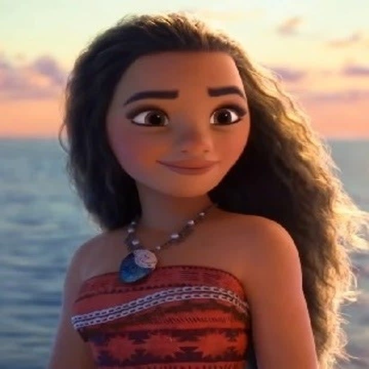 Disney's Moana standing with a slight smile