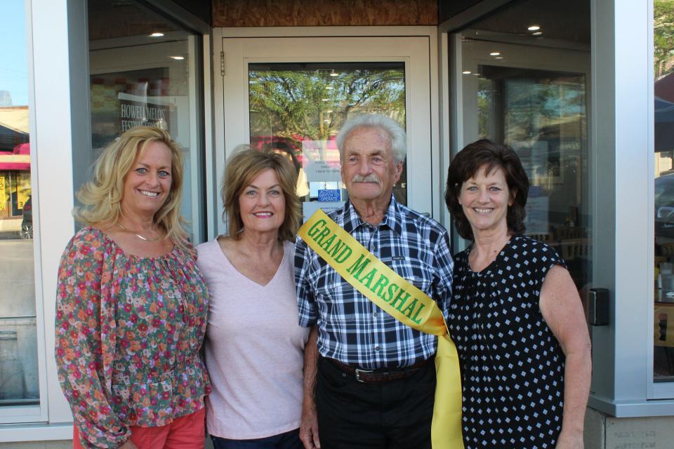 Howell resident Gerald Knight is named the 2022 Howell Melon Festival Grand Marshal. Pictured left to right, Daughters Polly Schmitz and Robin Love, Knight and Daughter Mandy Rutzel stand in front of Mark's Midtown Coney on Tuesday, June 28. Not pictured: Son Frank Knight.