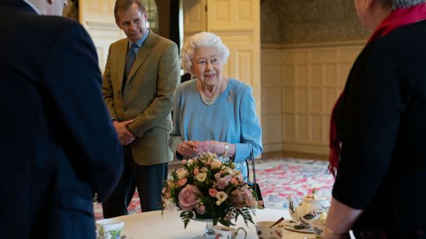 PHOTO: Britain's Queen Elizabeth II talks to pensioners from the Sandringham Estate during a reception in the Ballroom of Sandringham House, the Queen's Norfolk residence on Feb. 5, 2022, as she celebrates the start of the Platinum Jubilee.  (Joe Giddens/Pool/AFP via Getty Images)