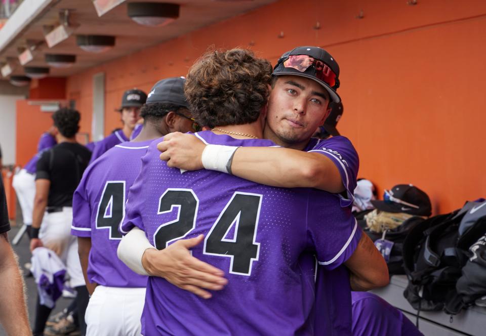 Grand Canyon players Jonny Weaver and Tayler Aguilar embrace after 8-7 loss to Missouri State. 
Senior Photographer Grand Canyon University