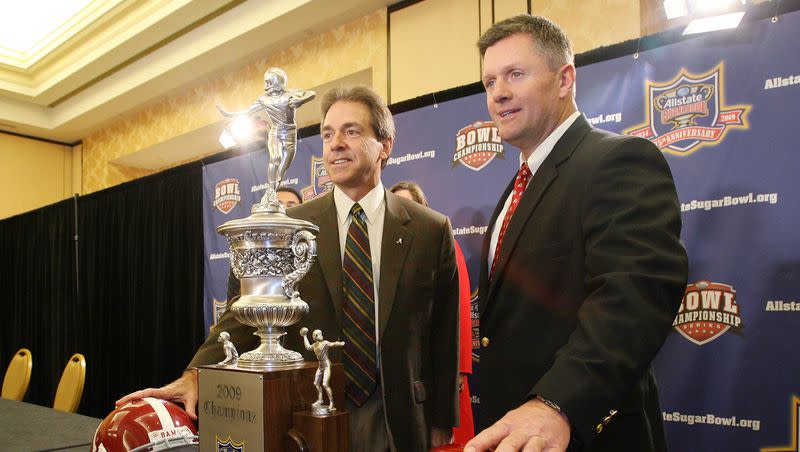 Utah head coach Kyle Whittingham, right, and Alabama coach Nick Saban pose with the Sugar Bowl Trophy during a press conference prior to the Sugar Bowl Jan. 1, 2009, in New Orleans. When the immensely popular and successful coach chooses to retire, what will happen to the program?