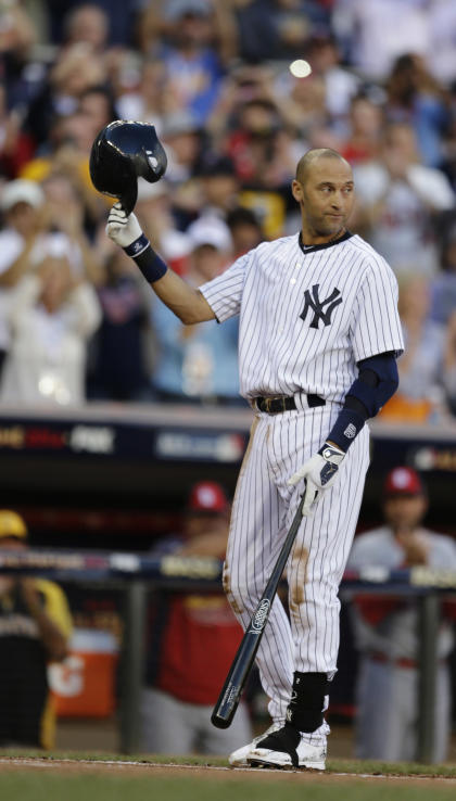 Derek Jeter waves to the crowd during the first inning of the All-Star Game. (AP)