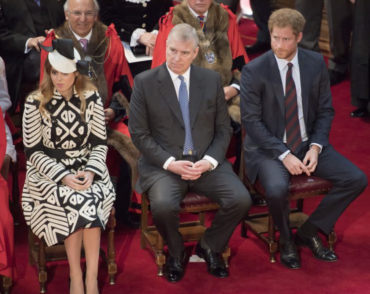 Prince Andrew with Princess Beatrice and Prince Harry (Photo: Arthur Edwards/The Sun/PA)