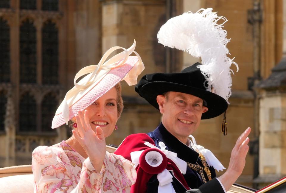 WINDSOR, ENGLAND - JUNE 17: Sophie, Duchess of Edinburgh, and her husband Prince Edward, Duke of Edinburgh wave at the crowds after attending the Order Of The Garter Service at Windsor Castle on June 17, 2024 in Windsor, England. The Order of the Garter, Britain's oldest chivalric order established by Edward III, includes The King, Queen, Royal Family members, and up to 24 companions honoured for their public service. Companions of the Garter are chosen personally by the Sovereign to honour those who have held public office, who have contributed in a particular way to national life or who have served the Sovereign personally. (Photo by Kirsty Wigglesworth - WPA Pool/Getty Images)