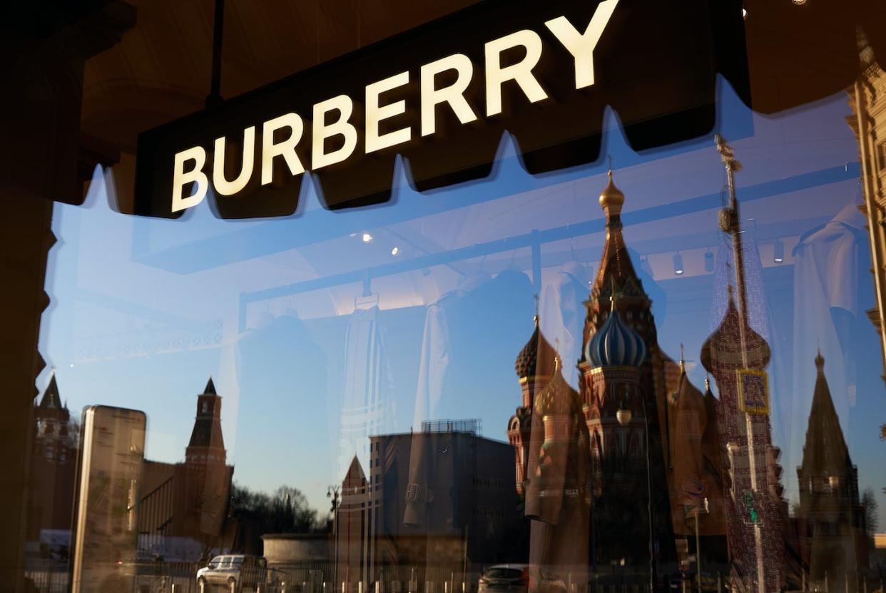 Burberry was one of the first Western companies to announce it was suspending sales in Russia after the invasion. <a href="https://www.gettyimages.com/detail/news-photo/the-tower-of-kremlin-reflexing-in-a-window-of-closed-news-photo/1239055957" rel="nofollow noopener" target="_blank" data-ylk="slk:Oleg Nikishin/Getty Images;elm:context_link;itc:0;sec:content-canvas" class="link ">Oleg Nikishin/Getty Images</a>