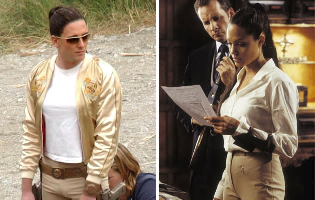 <b>Movie star stunt doubles</b><br><br> <b>Beauty and the beast…</b> something’s not right here. Yes, <b>Angelina Jolie’s</b> stunt double on ‘Tomb Raider’ was a particularly butch bloke with a wig and fake boobs. Those trousers look a tight fit. (Credit: Rex) <br><br><b>[Related gallery: <a href="http://uk.movies.yahoo.com/photos/best-movie-star-lookalikes-slideshow/" data-ylk="slk:Best movie star lookalikes;elm:context_link;itc:0;sec:content-canvas;outcm:mb_qualified_link;_E:mb_qualified_link;ct:story;" class="link  yahoo-link">Best movie star lookalikes</a>]</b>