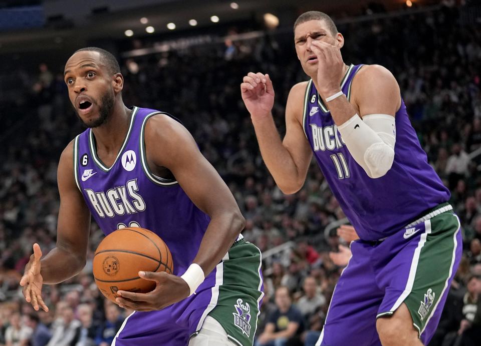 Milwaukee Bucks forward Khris Middleton, left, has a player option for next season, and center Brook Lopez is an unrestricted free agent.