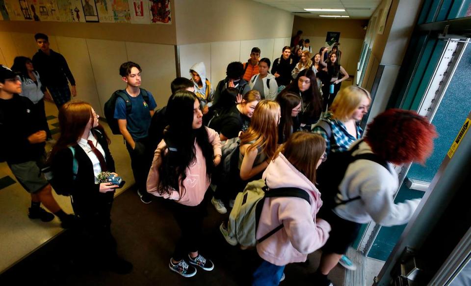 Converging hallways at Richland High School create congestion for students as they head home from classes.