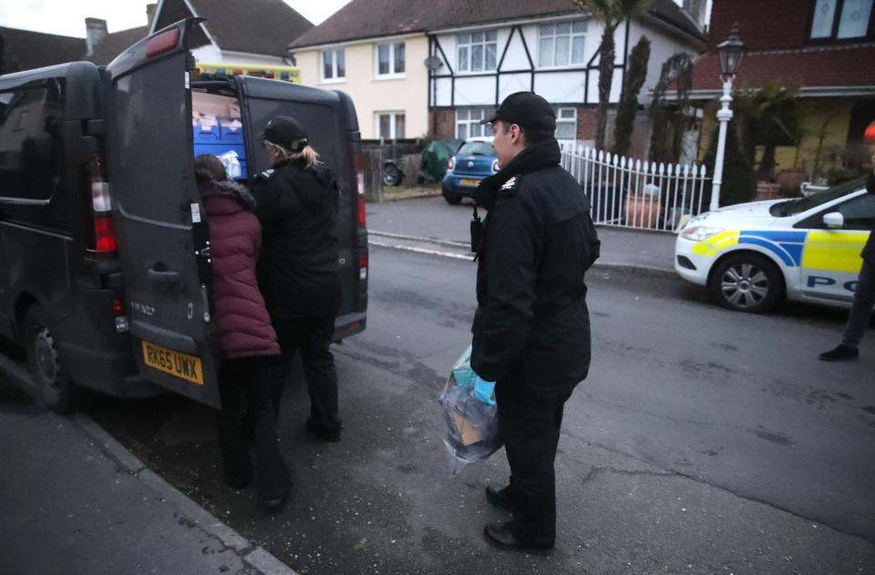 Police in Viola Avenue in Stanwell on Sunday (Steve Parsons/PA)