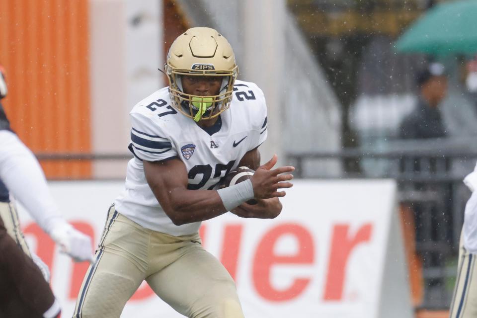 Akron running back Lorenzo Lingard, running the ball last month at Bowling Green, scored a touchdown for the Zips on Tuesday.